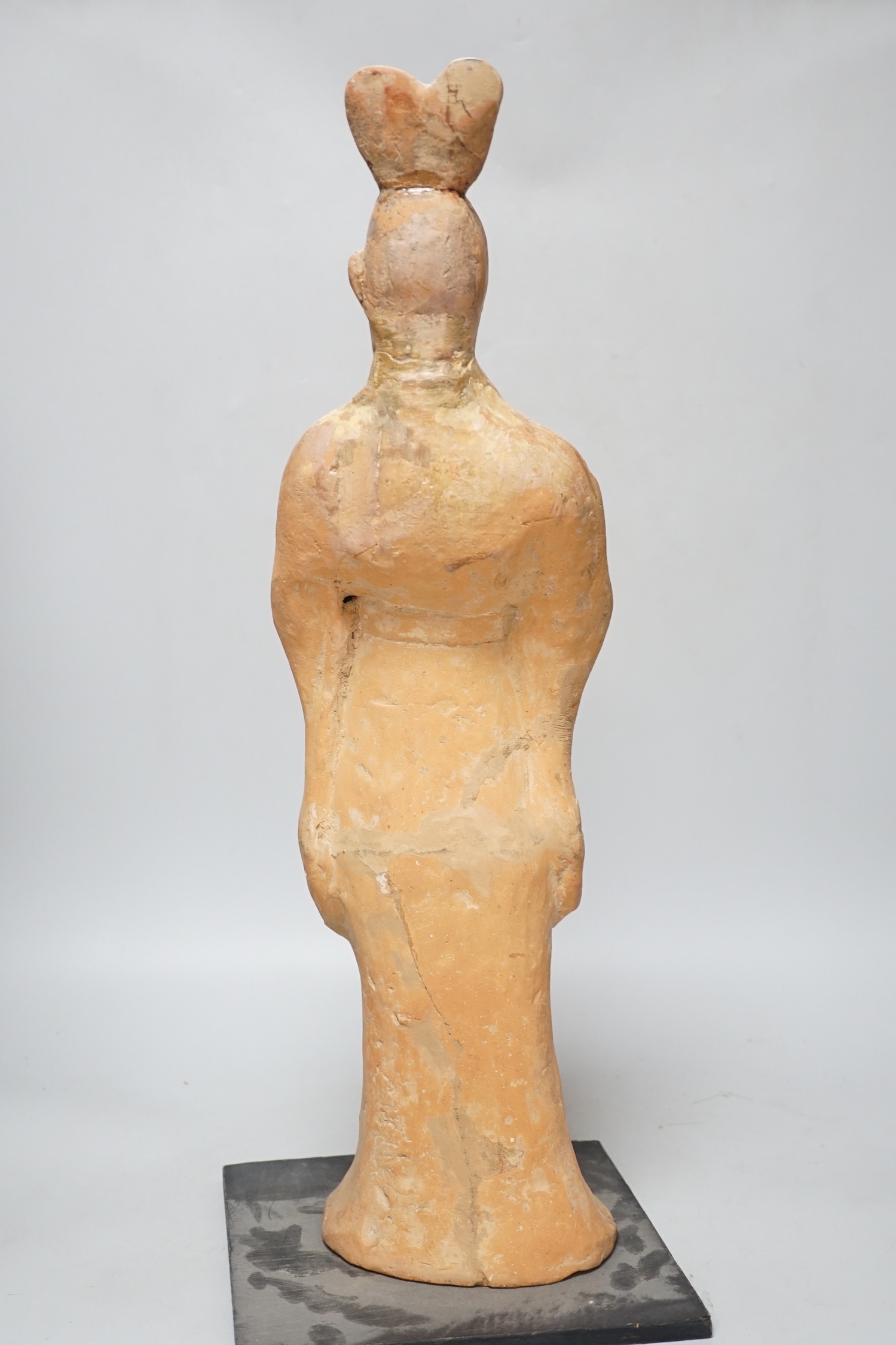 A large Chinese terracotta figure, Tang style, 55cm